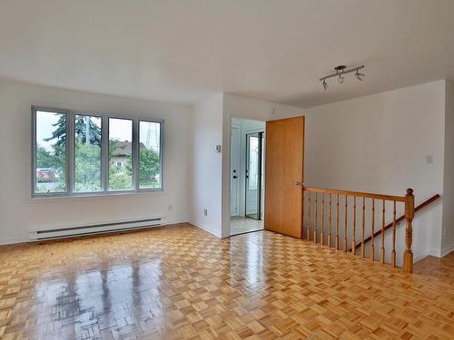 Living room - 1040 Rue Dion, Longueuil (Greenfield Park), QC - Indoor Photo Showing Other Room