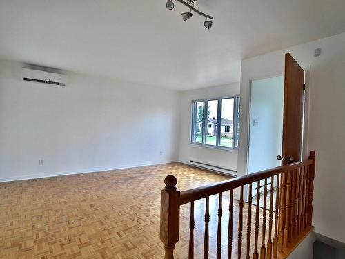 Living room - 1040 Rue Dion, Longueuil (Greenfield Park), QC - Indoor Photo Showing Other Room