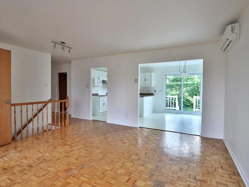 Living room - 1040 Rue Dion, Longueuil (Greenfield Park), QC - Indoor Photo Showing Other Room