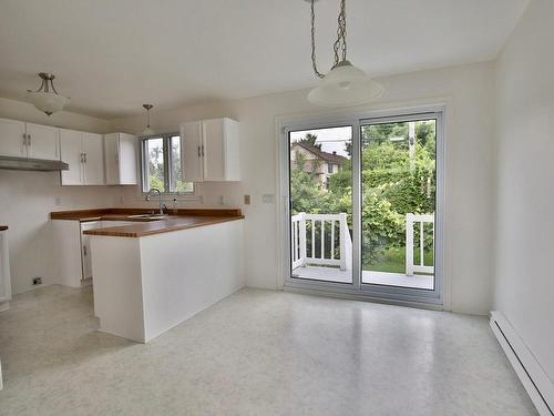 Salle Ã  manger - 1040 Rue Dion, Longueuil (Greenfield Park), QC - Indoor Photo Showing Kitchen With Double Sink