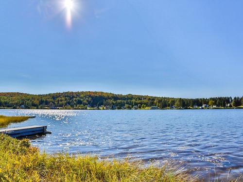 360 Ch. Du Lac-St-Louis E., Saint-Zénon, QC - Outdoor With Body Of Water With View