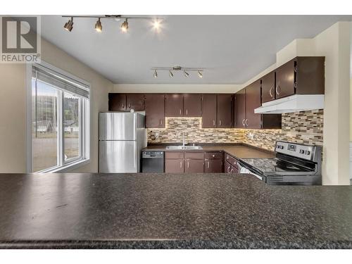 1212 Genevieve Crescent, Prince George, BC - Indoor Photo Showing Kitchen With Double Sink