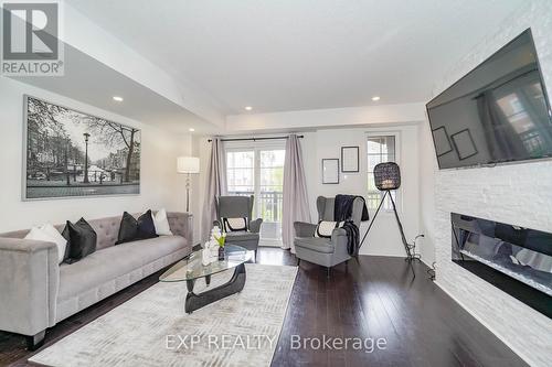 2560 Bromus Path, Oshawa (Windfields), ON - Indoor Photo Showing Living Room With Fireplace