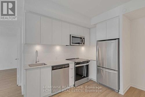 1011E - 8868 Yonge Street, Richmond Hill (South Richvale), ON - Indoor Photo Showing Kitchen With Upgraded Kitchen