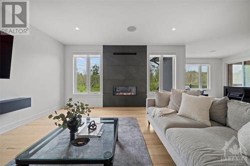 148 Westar Farm Way, Ottawa, ON - Indoor Photo Showing Living Room With Fireplace