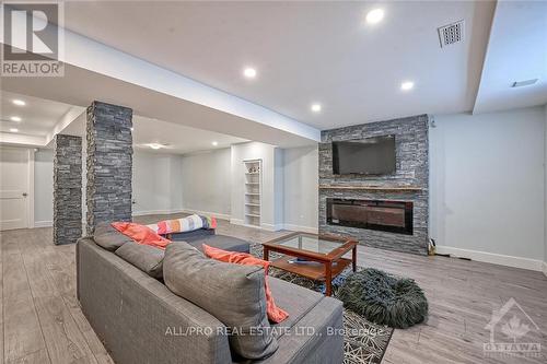 4318 Totem Drive, Ottawa, ON - Indoor Photo Showing Living Room With Fireplace