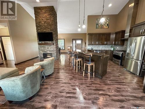 Holars Haven Acreage, Spy Hill Rm No. 152, SK - Indoor Photo Showing Dining Room With Fireplace