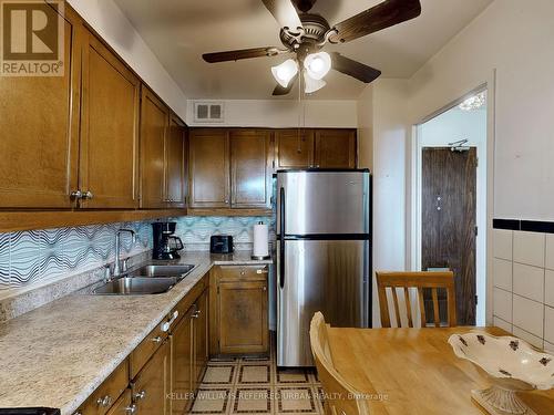 1111 - 10 Parkway Forest Drive, Toronto (Henry Farm), ON - Indoor Photo Showing Kitchen With Double Sink