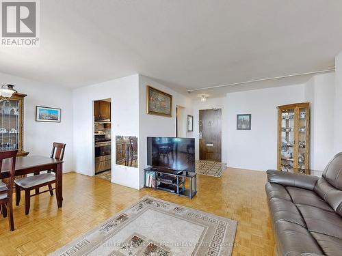 1111 - 10 Parkway Forest Drive, Toronto (Henry Farm), ON - Indoor Photo Showing Living Room