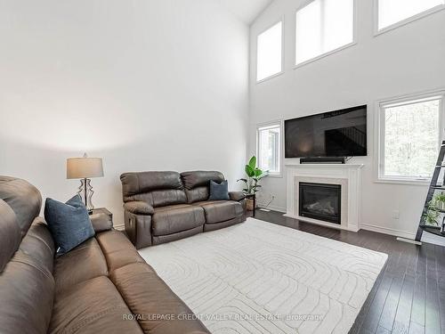 3040 Monarch Dr N, Orillia, ON - Indoor Photo Showing Living Room With Fireplace