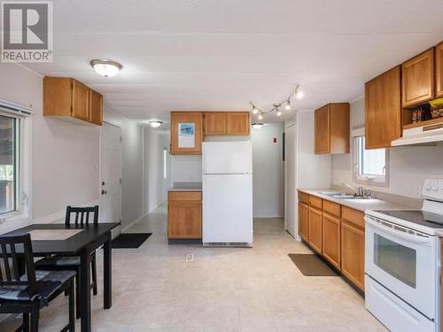 10-986 Range Road, Whitehorse, YT - Indoor Photo Showing Kitchen With Double Sink