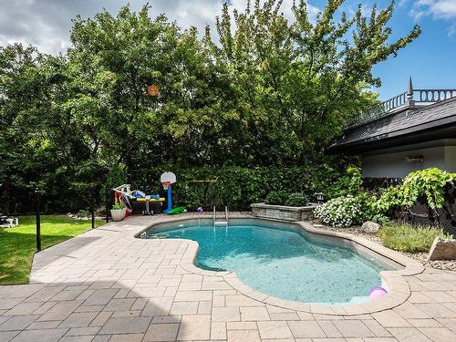 Piscine - 3995 Rue Fernand-Dumont, Montréal (Saint-Laurent), QC - Outdoor With In Ground Pool With Backyard