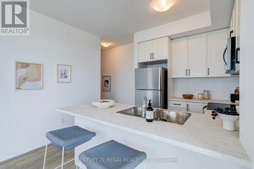 702 - 460 Dundas Street E, Hamilton (Waterdown), ON - Indoor Photo Showing Kitchen