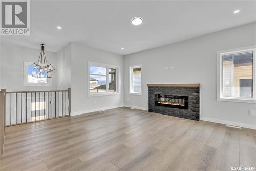 576 Kalra Street, Saskatoon, SK - Indoor Photo Showing Living Room With Fireplace