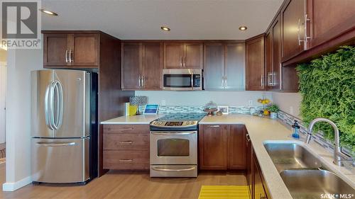 602 2300 Broad Street, Regina, SK - Indoor Photo Showing Kitchen With Stainless Steel Kitchen With Double Sink