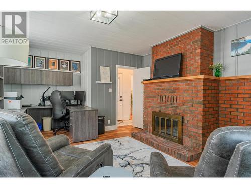 1101 Columbia  Avenue, Trail, BC - Indoor Photo Showing Living Room With Fireplace