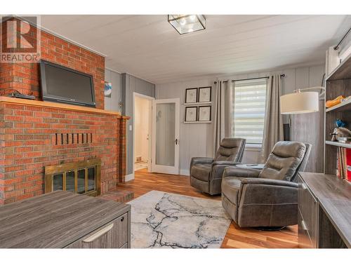 1101 Columbia  Avenue, Trail, BC - Indoor Photo Showing Living Room With Fireplace