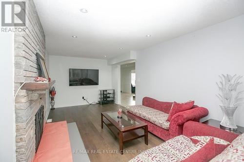 25 Oaklea Boulevard, Brampton (Fletcher'S Creek South), ON - Indoor Photo Showing Living Room With Fireplace