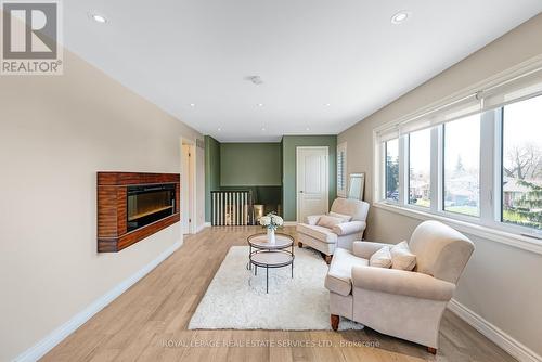 11 Rayne Avenue, Oakville (College Park), ON - Indoor Photo Showing Living Room With Fireplace