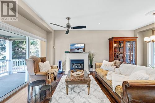 11 Rayne Avenue, Oakville (College Park), ON - Indoor Photo Showing Living Room With Fireplace