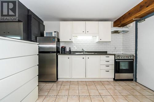 34 Penhurst Avenue, Toronto (Stonegate-Queensway), ON - Indoor Photo Showing Kitchen With Double Sink