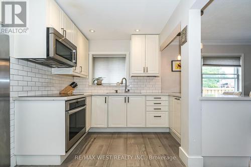 34 Penhurst Avenue, Toronto (Stonegate-Queensway), ON - Indoor Photo Showing Kitchen With Upgraded Kitchen