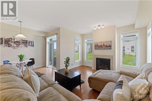 4935 Abbott Street E, Ottawa, ON - Indoor Photo Showing Living Room With Fireplace