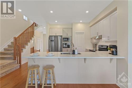 4935 Abbott Street E, Ottawa, ON - Indoor Photo Showing Kitchen With Double Sink With Upgraded Kitchen