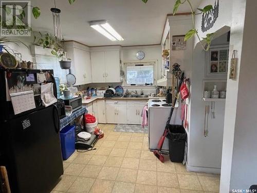 1731 103Rd Street, North Battleford, SK - Indoor Photo Showing Kitchen With Double Sink