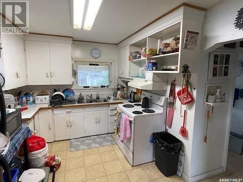 1731 103Rd Street, North Battleford, SK - Indoor Photo Showing Kitchen With Double Sink