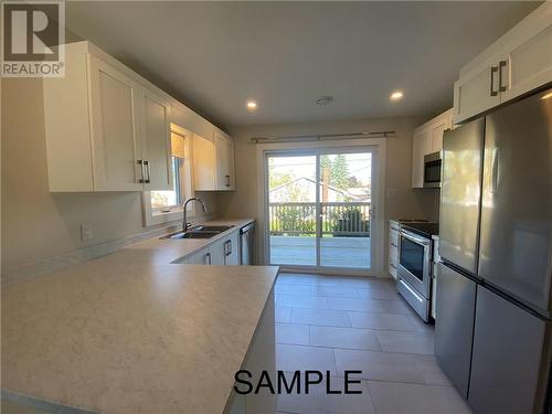 308 Highlandview, Moncton, NB - Indoor Photo Showing Kitchen With Double Sink