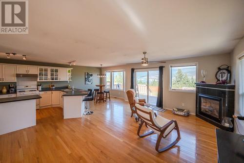 1893 Sandstone Drive, Penticton, BC - Indoor With Fireplace