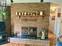 14446 2 Highway, Dawson Creek, BC  - Indoor Photo Showing Living Room With Fireplace 