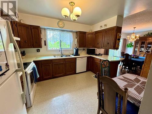 14446 2 Highway, Dawson Creek, BC - Indoor Photo Showing Kitchen With Double Sink