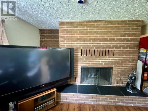 14446 2 Highway, Dawson Creek, BC - Indoor With Fireplace