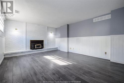 3206 Forest Glade Drive, Windsor, ON - Indoor Photo Showing Living Room With Fireplace