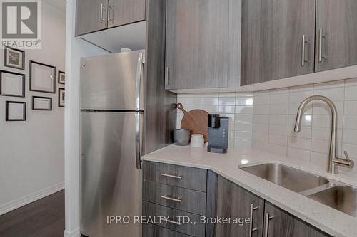 405 - 560 North Service Road, Grimsby, ON - Indoor Photo Showing Kitchen With Double Sink