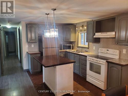 1 S. Fetterly Street, Huntsville, ON - Indoor Photo Showing Kitchen With Double Sink