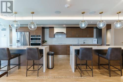 908 - 1050 Main Street E, Milton (Dempsey), ON - Indoor Photo Showing Kitchen With Stainless Steel Kitchen With Upgraded Kitchen