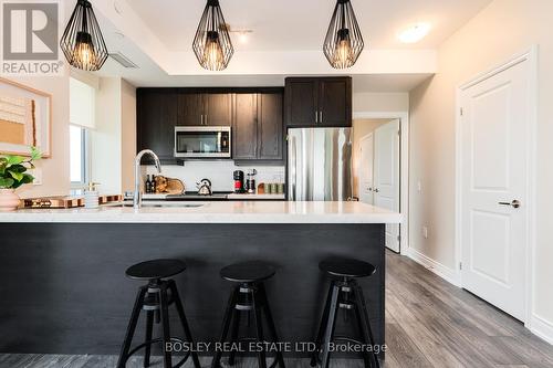 908 - 1050 Main Street E, Milton (Dempsey), ON - Indoor Photo Showing Kitchen With Stainless Steel Kitchen With Upgraded Kitchen