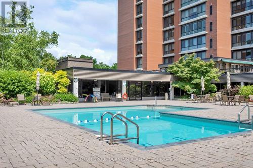 605 - 1400 Dixie Road, Mississauga (Lakeview), ON - Outdoor With In Ground Pool