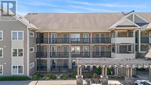 302 - 10 Brandy Lane Drive, Collingwood, ON - Outdoor With Balcony With Facade