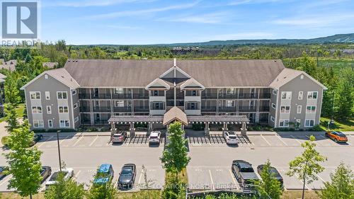 302 - 10 Brandy Lane Drive, Collingwood, ON - Outdoor With Facade