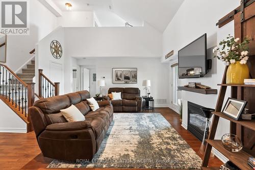 302 - 10 Brandy Lane Drive, Collingwood, ON - Indoor Photo Showing Living Room With Fireplace