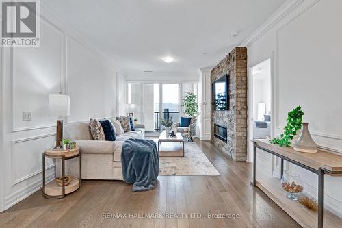 204 - 9075 Jane Street, Vaughan (Concord), ON - Indoor Photo Showing Living Room With Fireplace