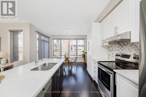 27 Gruenwald Gate, Brampton (Bram West), ON - Indoor Photo Showing Kitchen With Double Sink With Upgraded Kitchen