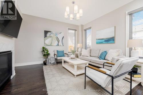 27 Gruenwald Gate, Brampton (Bram West), ON - Indoor Photo Showing Living Room With Fireplace