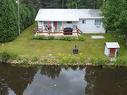 Aerial photo - 495 Rg Ste-Madeleine, La Malbaie, QC  - Outdoor With Body Of Water With Deck Patio Veranda 