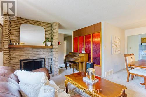 4 Cedar Glen, Grimsby, ON - Indoor Photo Showing Living Room With Fireplace