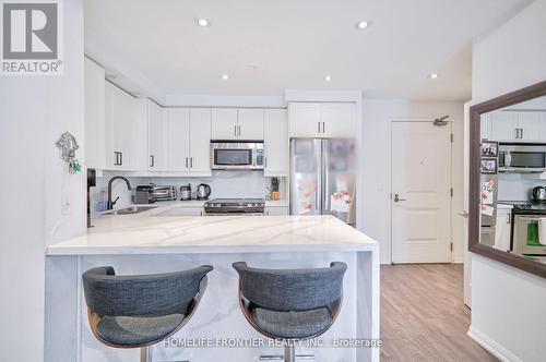 Th77B - 85 East Liberty Street, Toronto (Niagara), ON - Indoor Photo Showing Kitchen With Stainless Steel Kitchen With Double Sink